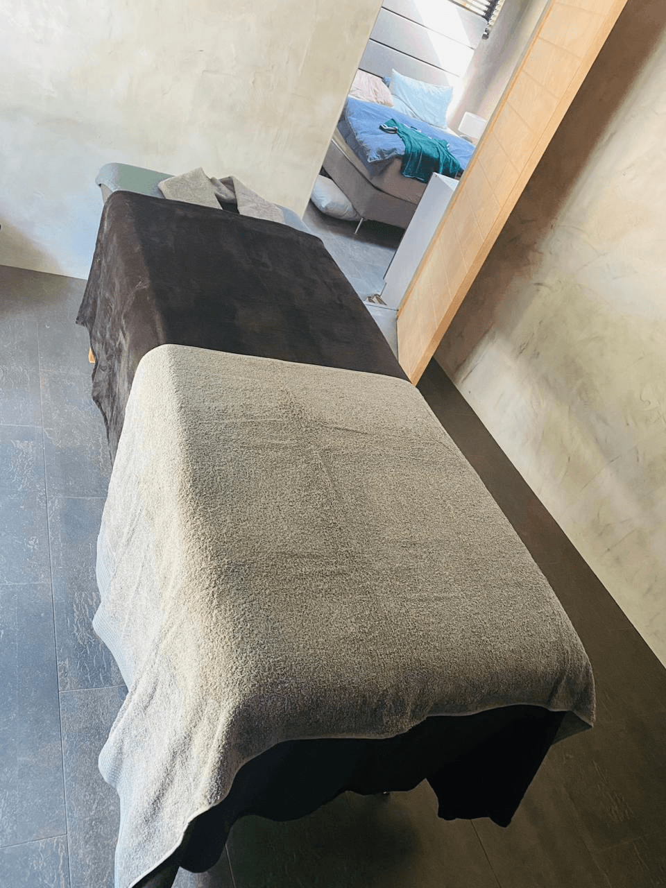 Rejuvenation mobile massage setup in Camps Bay beachfront villa — massage and facial treatment at home, Cape Town Atlantic Seaboard
